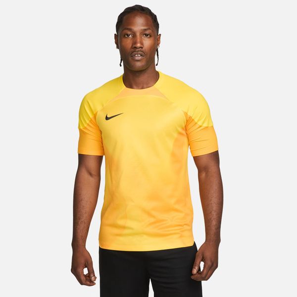 Koszulka treningowa męska Nike Gardien IV. Żółte t-shirty sportowe męskie Nike, m, z materiału, bez ramiączek, na fitness i siłownię, dri-fit (nike). Za 231.40 zł.