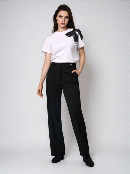 Spodnie pallazo - czarny. Czarne spodnie materiałowe damskie Sinsay, bez wzorów. Za 59.99 zł.