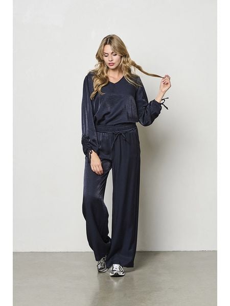 &Co Woman Spodnie "Solana" w kolorze czarnym rozmiar: 3XL. Czarne spodnie materiałowe damskie &Co Woman, bez wzorów, z materiału, z podwyższonym stanem. Za 130.05 zł.