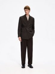 Spodnie wide leg z kantem - brązowy. Brązowe spodnie materiałowe męskie Reserved, bez wzorów, z tkaniny. Za 159.99 zł.