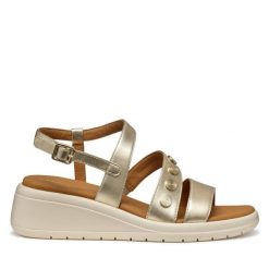 Sandały Geox. Żółte sandały damskie Geox, bez wzorów, bez obcasa, na koturnie. Za 399.99 zł.