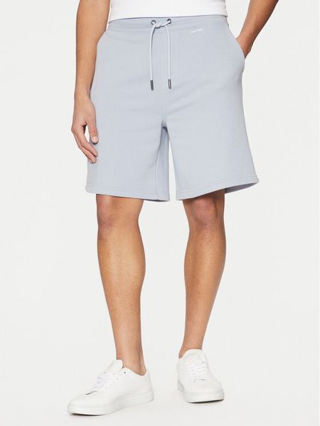 Calvin Klein Szorty sportowe Nano Logo K10K112689 Niebieski Regular Fit. Niebieskie szorty męskie CALVIN KLEIN, m, z bawełny. Za 209.99 zł.
