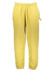 Nike Spodnie dresowe "Solo Swoosh" w kolorze żółtym rozmiar: S. Żółte spodnie dresowe męskie Nike, bez wzorów, z dresówki. Za 122.96 zł.