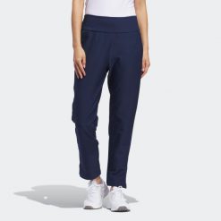 Spodnie do golfa damskie ADIDAS. Spodnie dresowe damskie Adidas, bez wzorów, z materiału, sportowe. Za 309.99 zł.