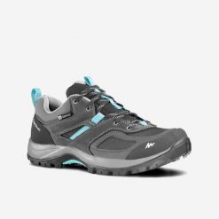 Buty turystyczne damskie Quechua MH100 niskie WTP. Niebieskie obuwie trekkingowe damskie QUECHUA. Za 229.99 zł.