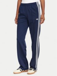 Adidas Spodnie dresowe Firebird Classic KS4795 Granatowy Regular Fit. Niebieskie spodnie dresowe damskie Adidas, s, bez wzorów, z dresówki. Za 299.99 zł.