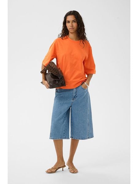 Soaked in Luxury Koszulka w kolorze pomarańczowym rozmiar: S. Pomarańczowe bluzki damskie Soaked in Luxury, s, bez wzorów, bez kołnierzyka. Za 104.99 zł.