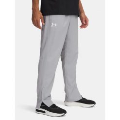 Spodnie męskie Under Armour Rival Woven Windbreaker Pant. Szare spodnie sportowe męskie Under Armour. Za 129.99 zł.