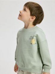 Bawełniana bluza z nadrukiem - jasnozielony. Zielone bluzy i bluzki niemowlęce Reserved, bez wzorów, z bawełny, bez ramiączek, bez kaptura. W wyprzedaży za 22.99 zł.