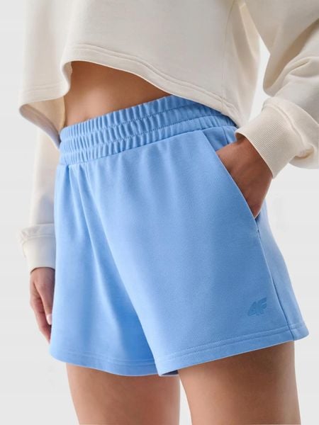 SPODENKI DAMSKIE 4F DRESOWE SPORTOWE TSHOF542 DO POŁOWY UDA KOLOR NIEBIESKI. Niebieskie spodenki sportowe damskie 4f, l, z bawełny, do biegania. Za 59.99 zł.