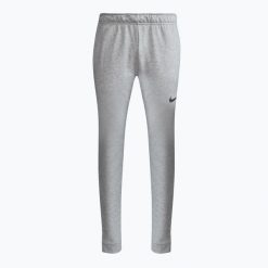 Spodnie męskie Nike Pant Taper dk. Szare spodnie materiałowe męskie Nike, bez wzorów, sportowe. Za 98.99 zł.