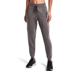 Spodnie Under Armour HeatGear, Kobiety. Szare spodnie materiałowe damskie Under Armour, bez wzorów, z poliesteru. Za 290.00 zł.