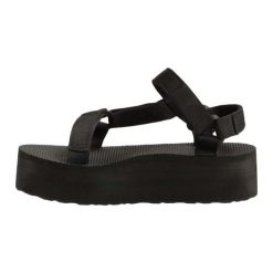 Sandały Teva Model W Flatform Univers Kolor Czarny. Czarne sandały damskie Teva, bez wzorów, z materiału, bez obcasa. Za 298.00 zł.