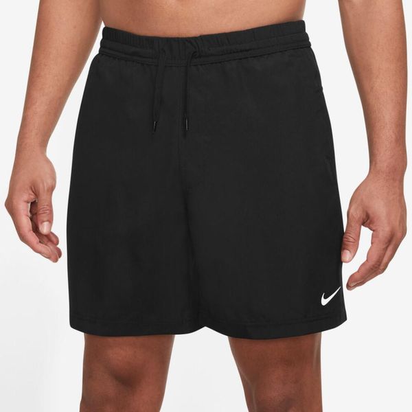 Spodnie Mężczyzna Nike Pantalón Corto Dry Fit czarny. Czarne spodnie sportowe męskie Nike, z materiału. Za 323.00 zł.