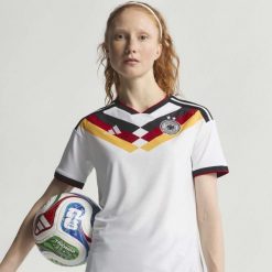 Koszulka Germany 26 Home Authentic Women's Team. Białe bluzki damskie Adidas, s, bez wzorów, sportowe, bez kołnierzyka, bez ramiączek. Za 649.00 zł.