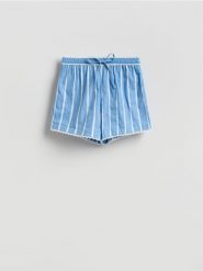 Wzorzyste szorty - jasnoniebieski. Niebieskie szorty damskie Reserved, bez wzorów, z bawełny, klasyczne. Za 139.99 zł.