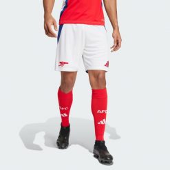 Szorty Arsenal 24/25 Home. Białe szorty męskie Adidas, z materiału, bez kołnierzyka. W wyprzedaży za 139.30 zł.