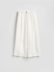 Spodnie z lnem - biały. Białe spodnie materiałowe damskie Reserved, bez wzorów, z tkaniny. Za 129.99 zł.