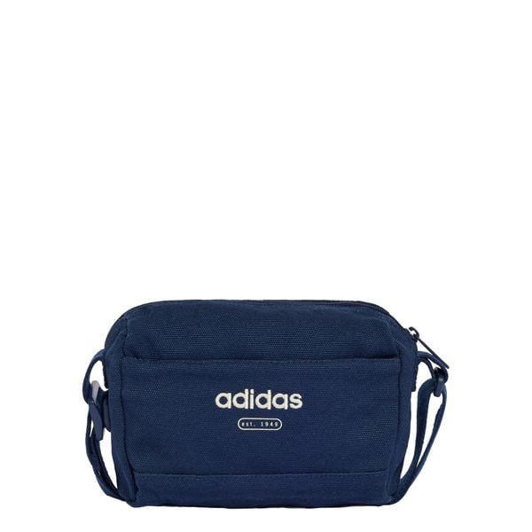 TORBA CANVAS CROSS BODY. Białe torby męskie na ramię Adidas, bez wzorów, z bawełny, na ramię, małe. Za 109.00 zł.