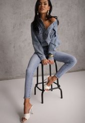 Niebieskie Jeansy Typu Skinny z Bawełny Nevitaes. Niebieskie jeansy damskie Renee, z podwyższonym stanem. Za 99.99 zł.