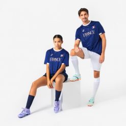 Koszulka piłkarska dla kibiców Francja 2026. Białe t-shirty damskie KIPSTA, xl, z materiału, bez ramiączek, do piłki nożnej. Za 44.99 zł.