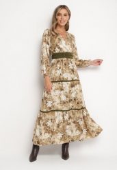 Beżowa Kopertowa Rozkloszowana Sukienka Ozdobiona Paskiem i Falbanami Fezisia. Brązowe sukienki damskie Born2be, l, bez wzorów, eleganckie, bez kołnierzyka, bez ramiączek, maxi, kopertowe. W wyprzedaży za 111.99 zł.
