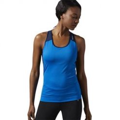 Koszulka treningowa damska Reebok Racerback. Niebieskie bluzki sportowe damskie Reebok, s, z materiału, bez kołnierzyka, bez ramiączek. Za 141.00 zł.