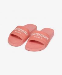 Superdry klapki Destination Pool z wyściełanym paskiem – Peach Amber Pink. Czerwone klapki damskie Superdry., bez wzorów, z poliesteru, bez obcasa. Za 152.50 zł.