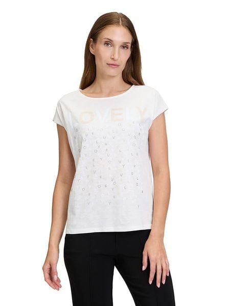 CARTOON Koszulka w kolorze białym rozmiar: 36. Białe bluzki damskie Cartoon, bez wzorów, z bawełny, bez kołnierzyka, bez ramiączek. Za 69.75 zł.