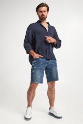 Spodenki jeansowe męskie ARMANI EXCHANGE. Szorty męskie Armani Exchange, z jeansu, bez kołnierzyka. W wyprzedaży za 404.25 zł.