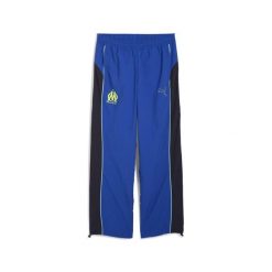 Męskie spodnie FtblEssentials Cellerator Olympique Marsylia PUMA. Niebieskie spodnie materiałowe męskie Puma, bez wzorów, sportowe. Za 379.00 zł.