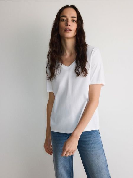 T-shirt z merceryzowaną bawełną - biały. Białe t-shirty damskie Reserved, l, bez wzorów, z bawełny, bez kołnierzyka. W wyprzedaży za 59.99 zł.