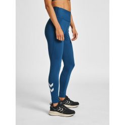 Damskie wysokie legginsy Hummel MT Grace. Niebieskie legginsy sportowe damskie HUMMEL, xs, bez wzorów, z materiału, na fitness i siłownię. W wyprzedaży za 226.50 zł.