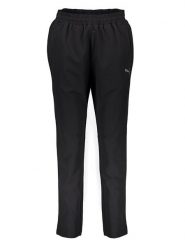 Puma Spodnie dresowe "Typhoon" w kolorze czarnym rozmiar: L. Czarne spodnie dresowe męskie Puma, bez wzorów, z dresówki. Za 140.86 zł.