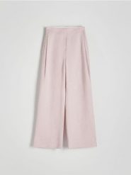 Spodnie z lnu i wiskozy - brudny róż. Czerwone spodnie materiałowe damskie Reserved, bez wzorów, z wiskozy. W wyprzedaży za 119.99 zł.