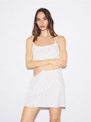 Bawełniana koszula nocna - złamana biel. Koszule nocne damskie Reserved, bez wzorów, z bawełny. Za 69.99 zł.