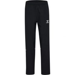 Damskie spodnie dresowe Hummel Core 2.0 Woven. Białe spodnie dresowe damskie HUMMEL, z dresówki, na fitness i siłownię. Za 230.00 zł.