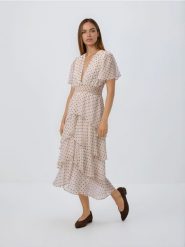 Sukienka w groszki - złamana biel. Sukienki damskie Reserved, l, bez wzorów, z tkaniny, klasyczne, bez kołnierzyka, bez ramiączek. Za 229.99 zł.