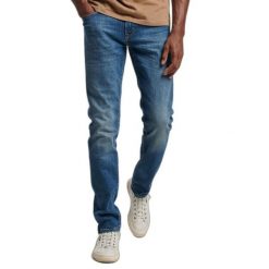 Dżinsy slim fit z bawełny organicznej Superdry. Niebieskie jeansy męskie Superdry. Za 370.90 zł.