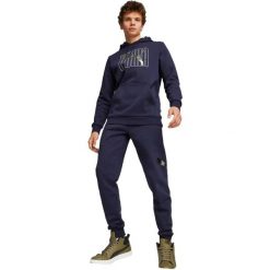 Spodnie męskie Puma Ess Logo Lab Sweatpant. Niebieskie spodnie materiałowe męskie Puma, bez wzorów, z bawełny. Za 290.00 zł.