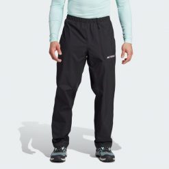 Spodnie Terrex Multi RAIN.RDY 2-Layer Rain. Czarne spodnie sportowe męskie Adidas, z materiału. W wyprzedaży za 299.40 zł.