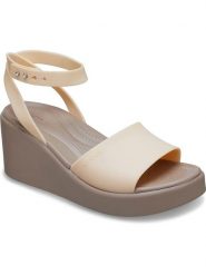 Crocs Sandały "Brooklyn" w kolorze beżowym na koturnie rozmiar: 42/43. Brązowe sandały damskie Crocs, bez wzorów, bez obcasa, na koturnie. Za 144.95 zł.