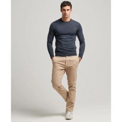 Sweter z wełny merynosów Superdry. Niebieskie swetry męskie Superdry., l, bez wzorów, prążkowane, bez kołnierzyka. Za 339.85 zł.