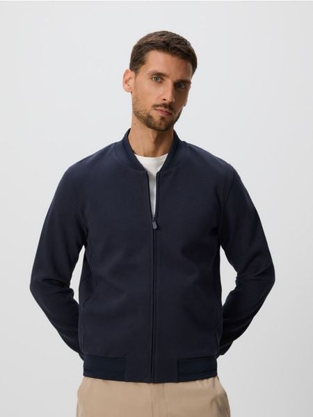 Bluza bomberka - szary. Szare bluzy bez kaptura męskie Reserved, l, z bawełny. W wyprzedaży za 79.99 zł.