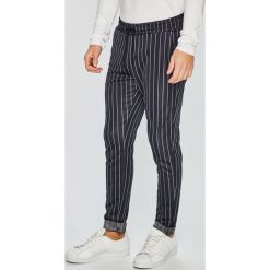 Only & Sons - Spodnie. Niebieskie spodnie materiałowe męskie Only & Sons, bez wzorów, z bawełny, casualowe. W wyprzedaży za 99.90 zł.