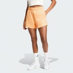 Luźne szorty Soft Lux. Brązowe spodenki sportowe damskie Adidas, bez wzorów, sportowe. Za 219.00 zł.
