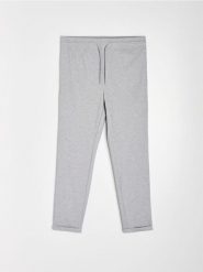 Spodnie jogger slim fit z domieszką wiskozy - szary. Szare spodnie materiałowe męskie Sinsay, bez wzorów, z wiskozy, sportowe. Za 49.99 zł.