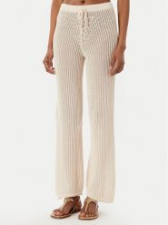 Guess Spodnie plażowe E6GB00 Z5371 Beżowy jasny Regular Fit. Brązowe spodnie materiałowe damskie Guess, z aplikacjami, z bawełny. Za 394.99 zł.