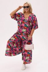 Wakacyjny różowy komplet Tropica Owocowa Fiesta (bluzka + spódnico - spodnie) PLUS SIZE XXL OVERSIZE. Czerwone spodnie materiałowe damskie Moda Size Plus Iwanek, bez wzorów, z bawełny, eleganckie, plus size. Za 379.90 zł.