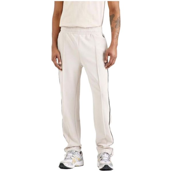 Spodnie męskie Ellesse Inzagi Track. Białe spodnie materiałowe męskie Ellesse, bez wzorów, z elastanu, sportowe. Za 199.99 zł.